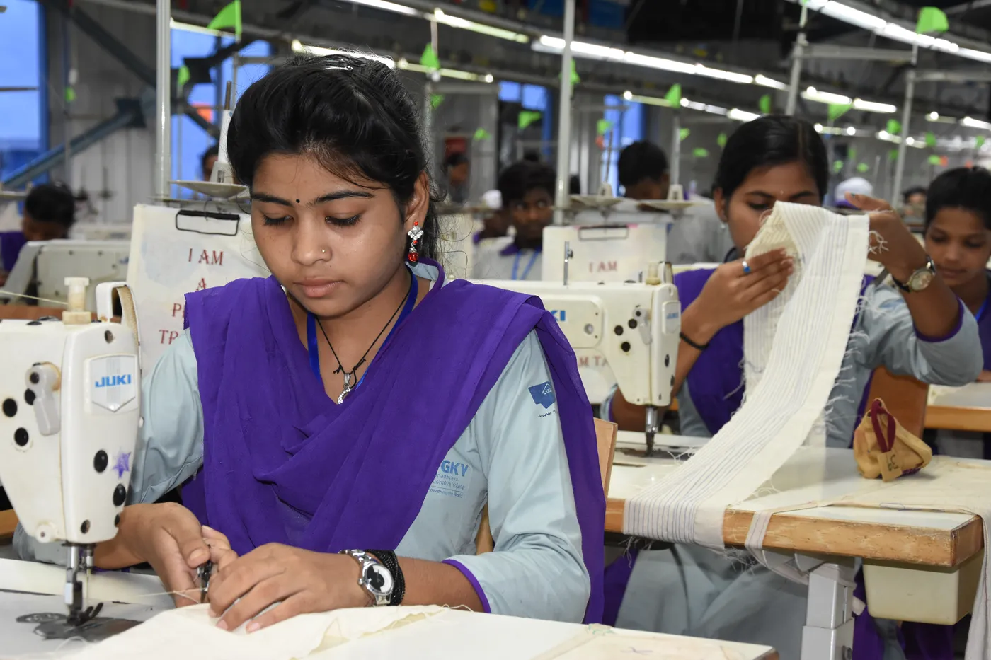 Sewing machine operator on a JUKI industrial machine